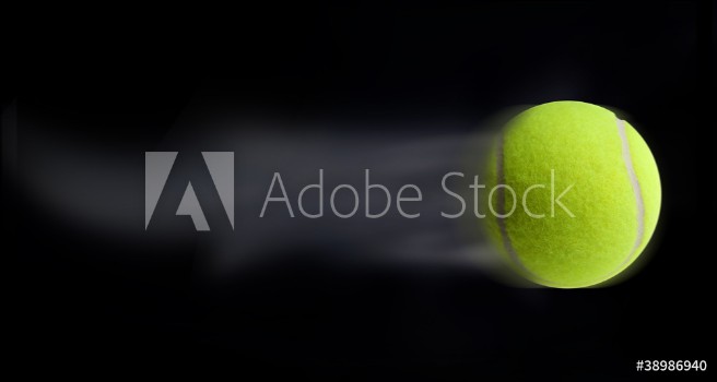 Picture of Tennis ball fast moving on black background